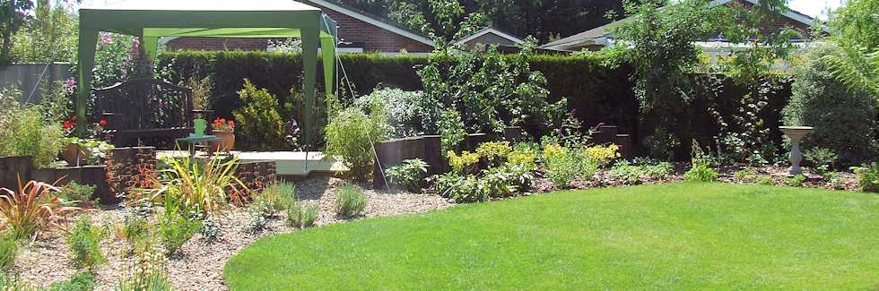 New garden design with turfing, borders, garden features and patio area